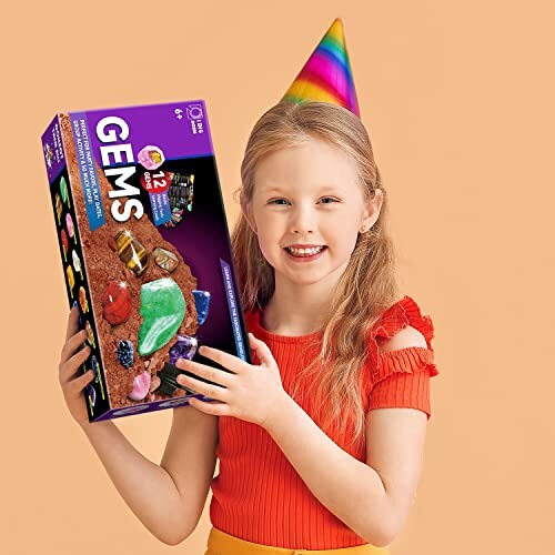 Barn håller en ädelsten-sats