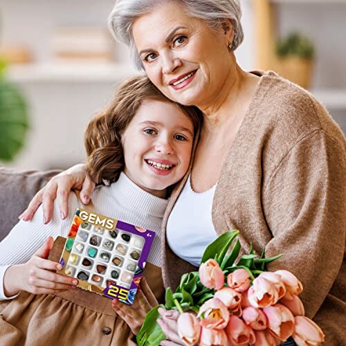 Äldre kvinna och flicka med smyckeskit och blommor.