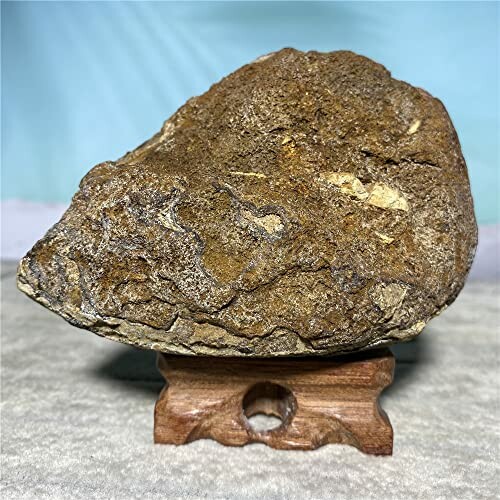 Naturlig sten på träställning