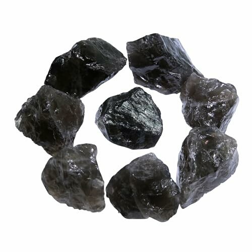 Rå svarta ädelstenar i cirkel